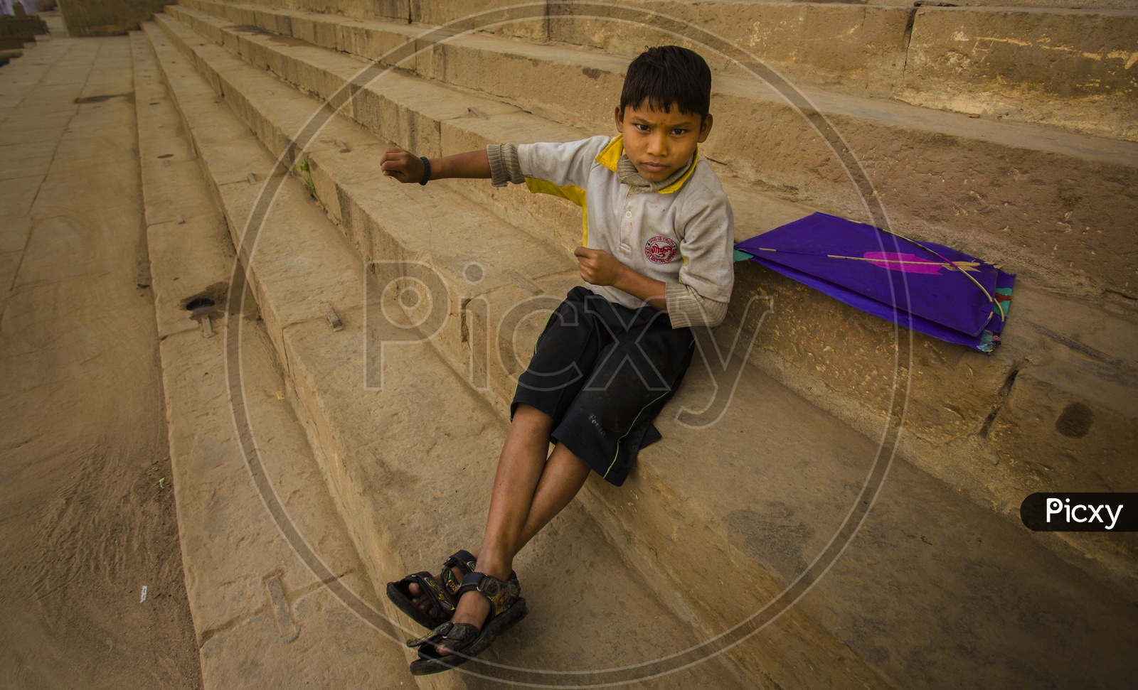 Boy With Kite On Bank Of River Ganga / Varanasi Local Children