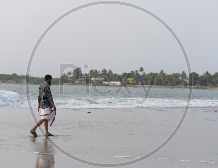 Lonely Man at Kochi Beach