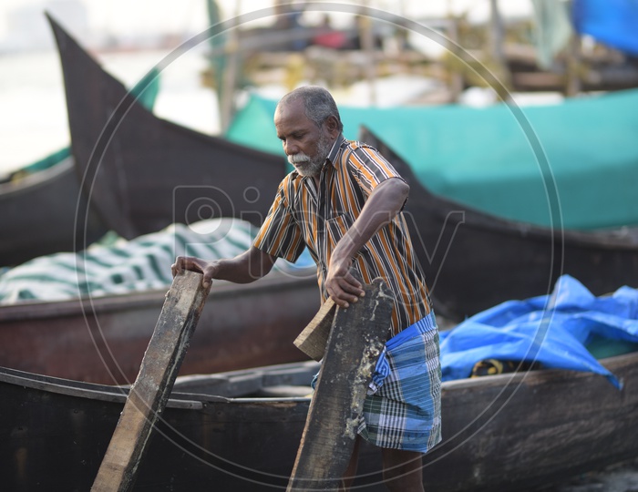 Fisherman at work - Kochi Beach