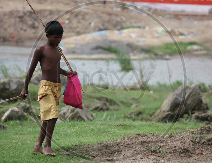 A Boy, going for fishing.