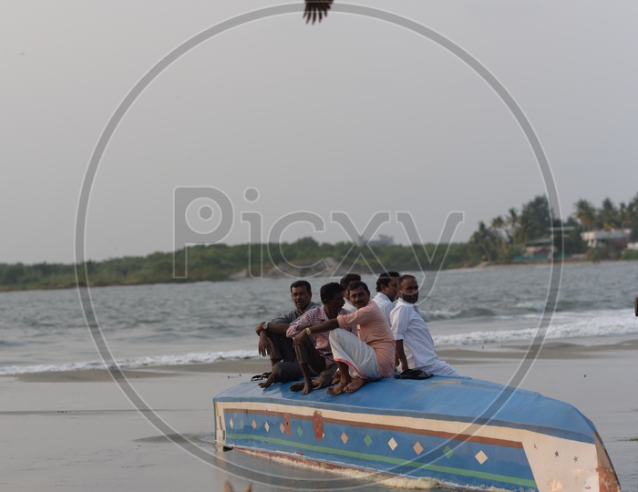 Men on Boat at Kochi Beach