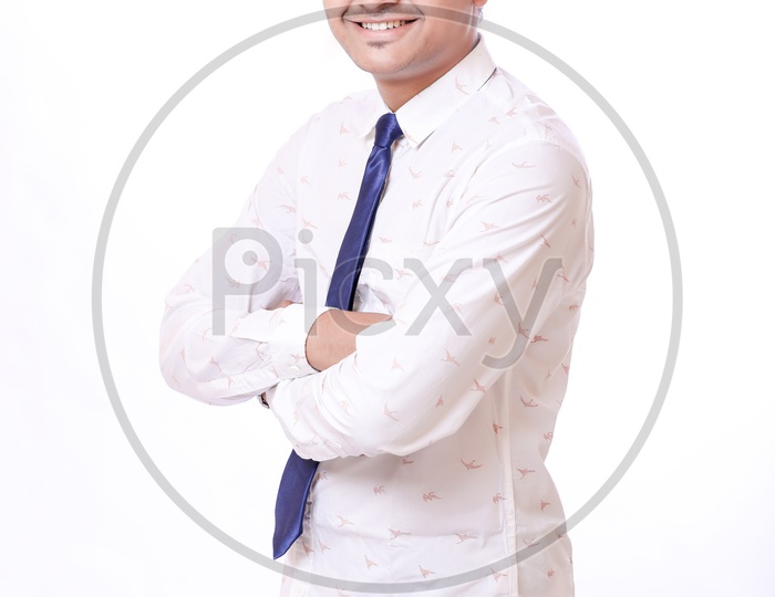 Portrait Of A Confident Youngman in Formalwear and Folding his Hands   On An Isolated  White  Background
