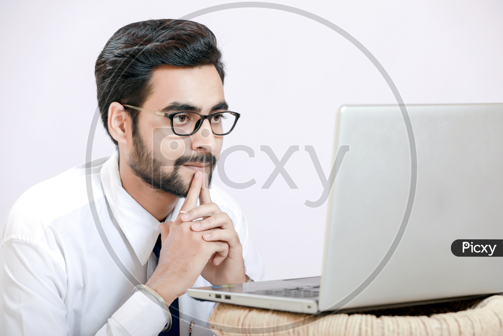 Indian Young Man with Laptop