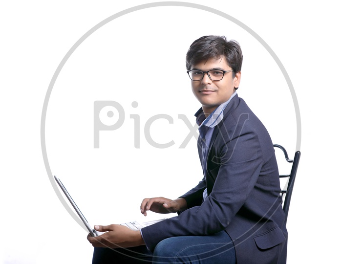 Young Indian College Student with Laptop, Indian Male Model on White Background