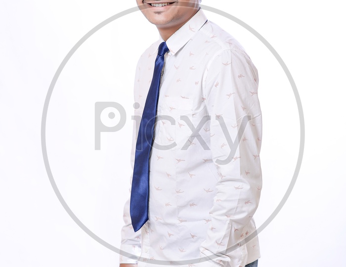 Portrait Of A Confident Youngman in Formalwear  On An Isolated  White  Background