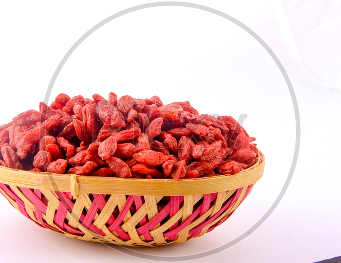 Red Raisins Bowl in White Background