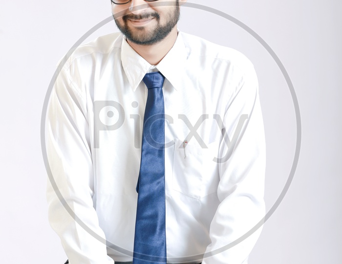 Young handsome man with White background a happy and cool smile on face / Young Man Portrait / Happy Face