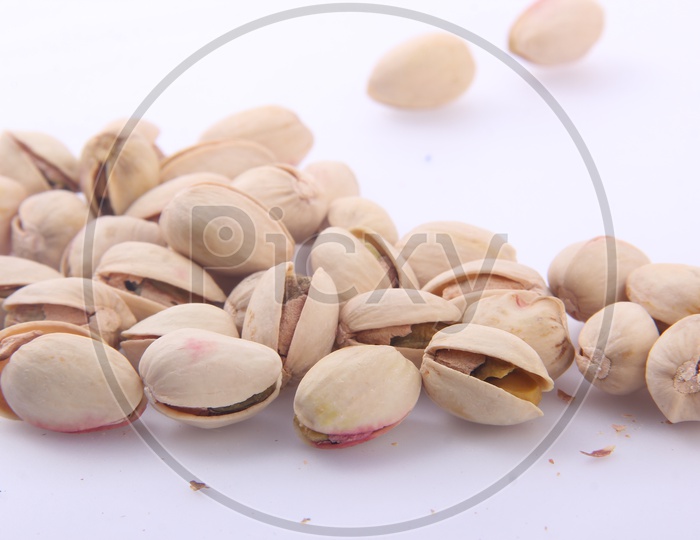 Pistachio Nuts Isolated Shot on a White Back Ground