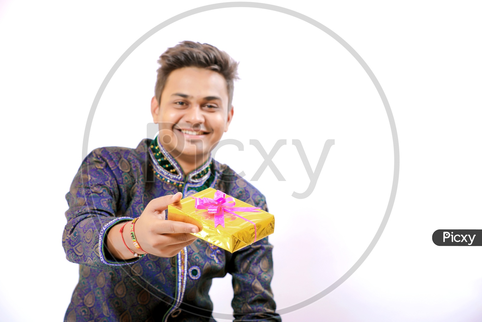 Indian Man Giving Gift Box On an Isolated White Background