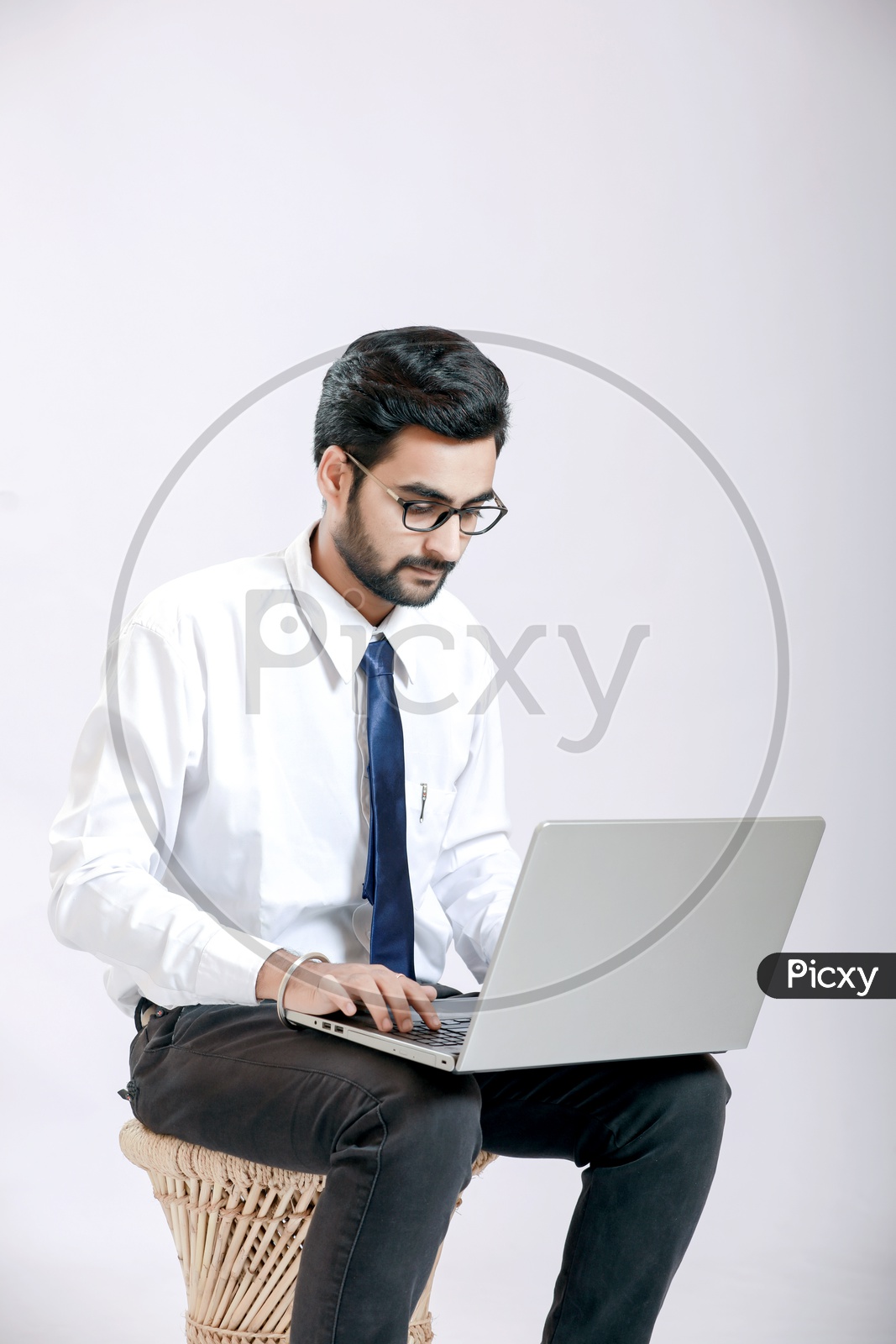 Indian Young Man with Laptop