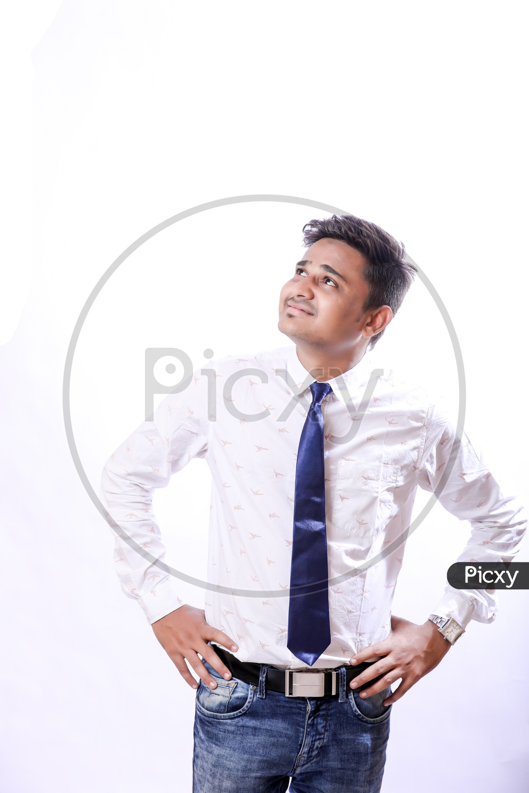 Portrait Of A Confident Youngman in Formalwear  With Expression and looking to Space With White  Background