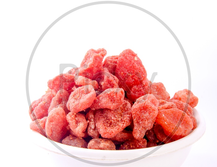 Dry Red Berries in a Bowl On an Isolated White Background