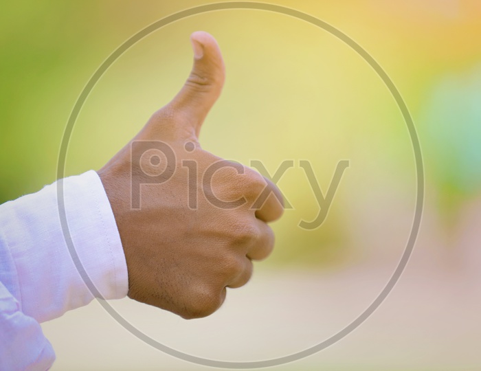 Indian Hand Showing Thumbs up Sign