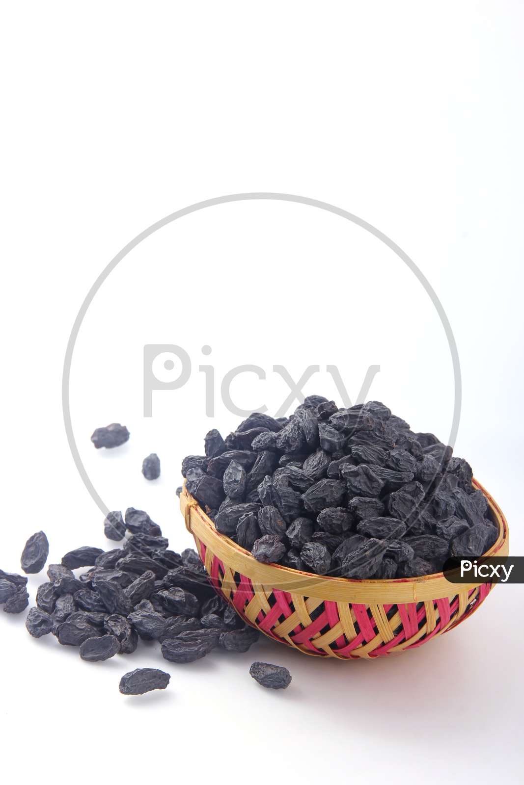 Dried fruit -  Kiss miss in a bowl  on white background