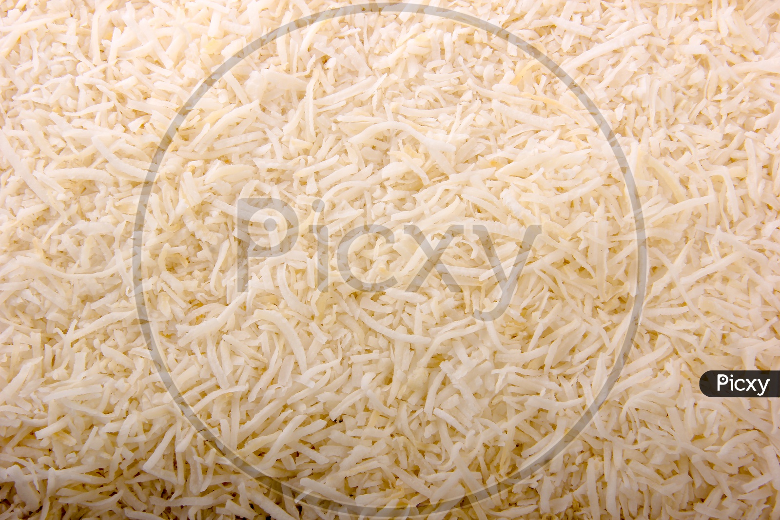 Grated Coconut Dried Composition Shot Forming a Background