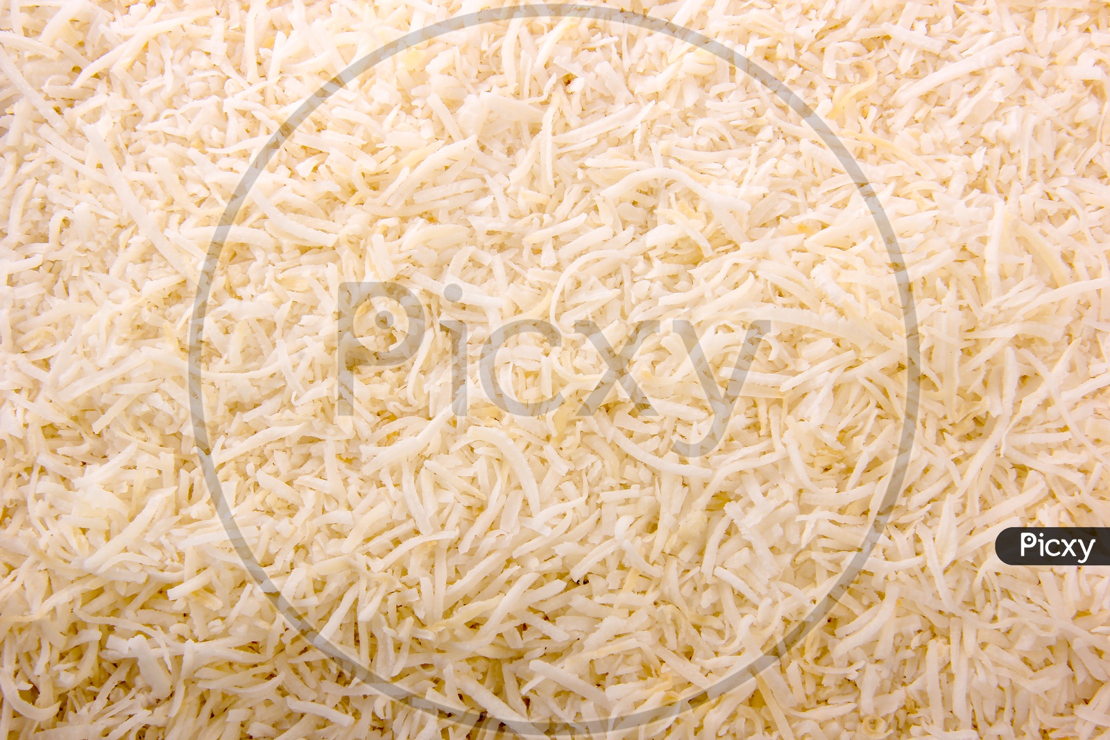 Grated Coconut Dried Composition Shot Forming a Background