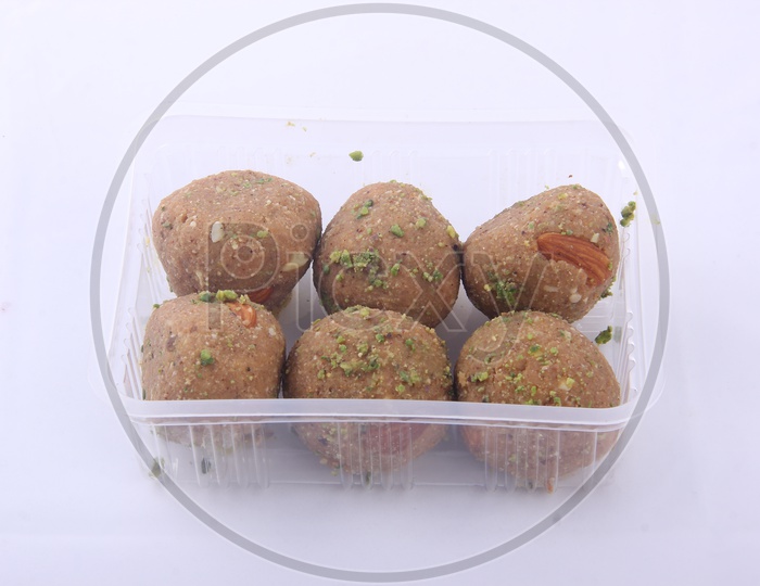 Dry Fruit Laddu in a Bowl on a Isolated White Background