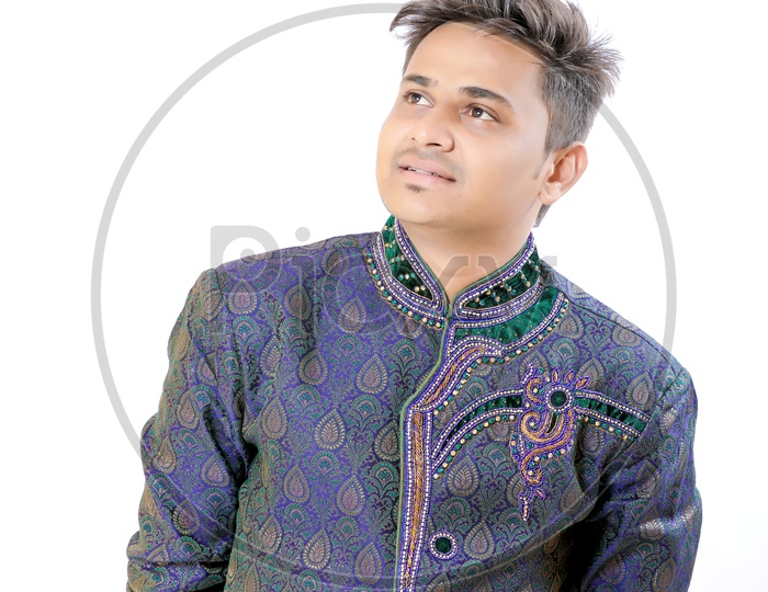 Indian Man In a Traditional Wear Looking To space on an Isolated White Background
