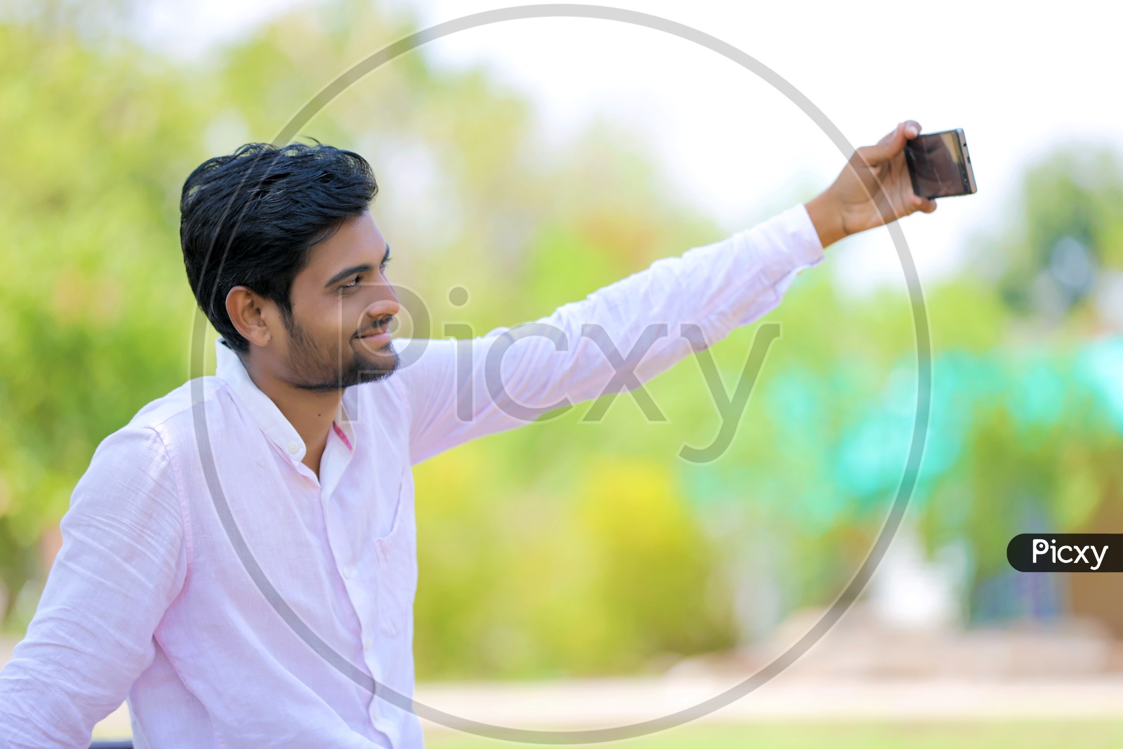 Young crazy Indian girl taking selfie | Photoskart