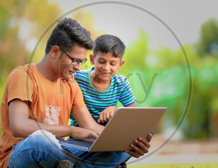 Indian School Youth/Child using Laptop