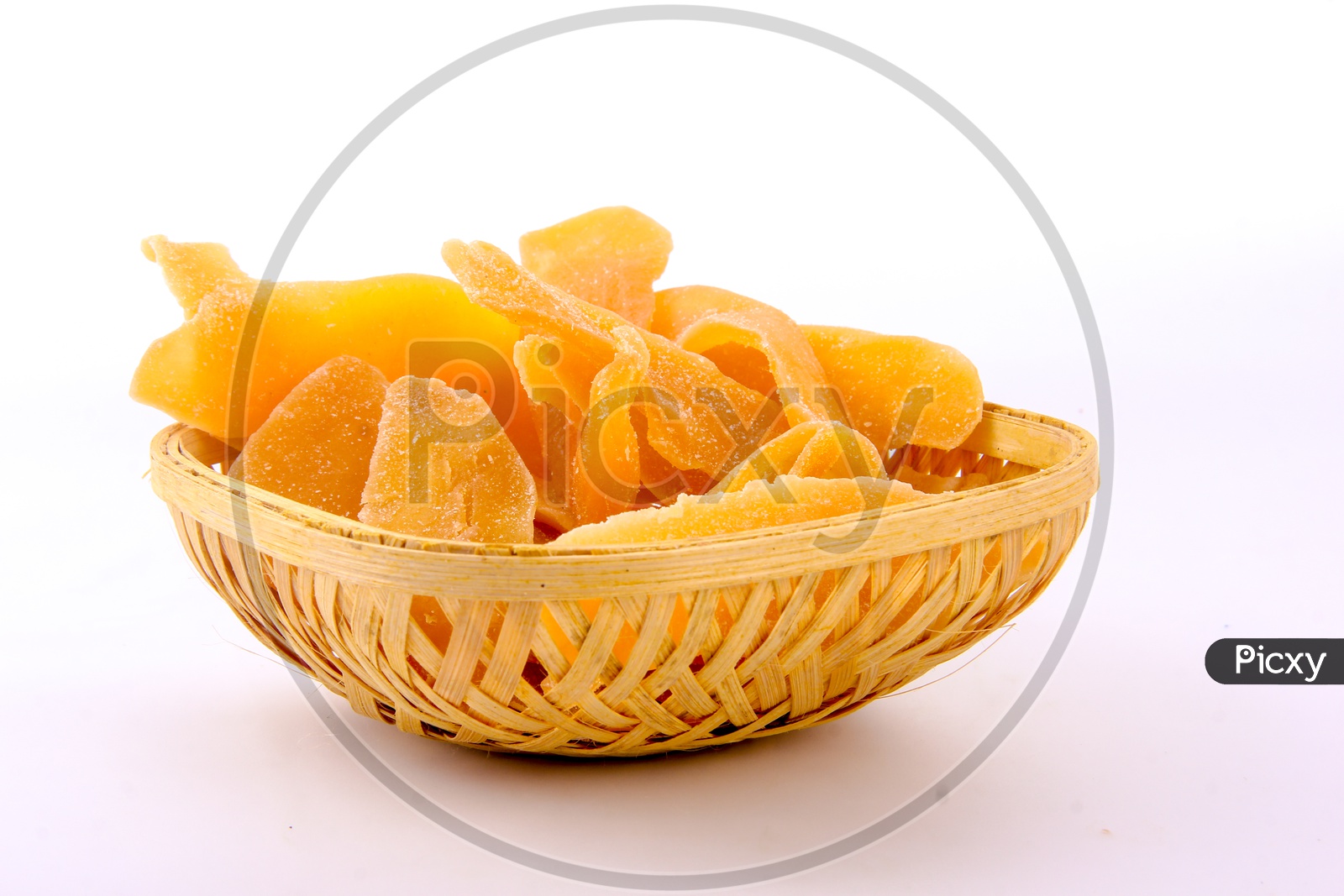 Dried Mango Slices In a Bowl On an Isolated White Back Ground
