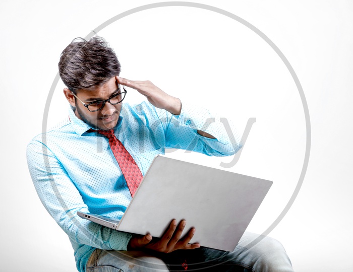 Young Indian Businessman with Laptop