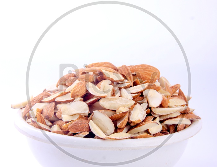 Sliced Almonds in Bowl on a Isolated White Background