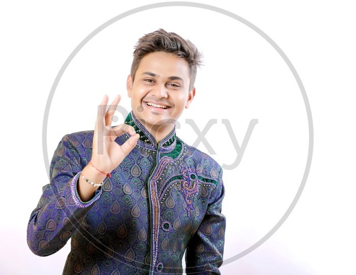Indian Man In a Traditional Wear with  Expression and Hand Signs gestures on an Isolated White Background