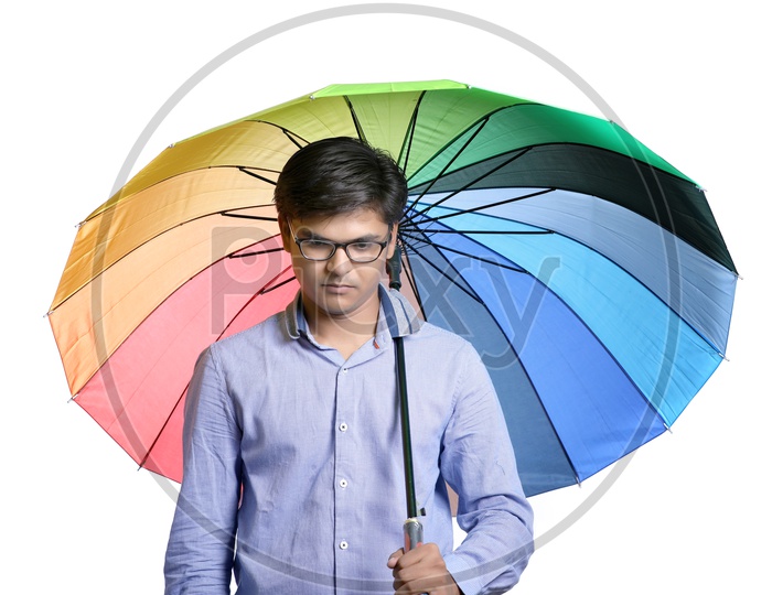 Yong Indian Man with Umbrella