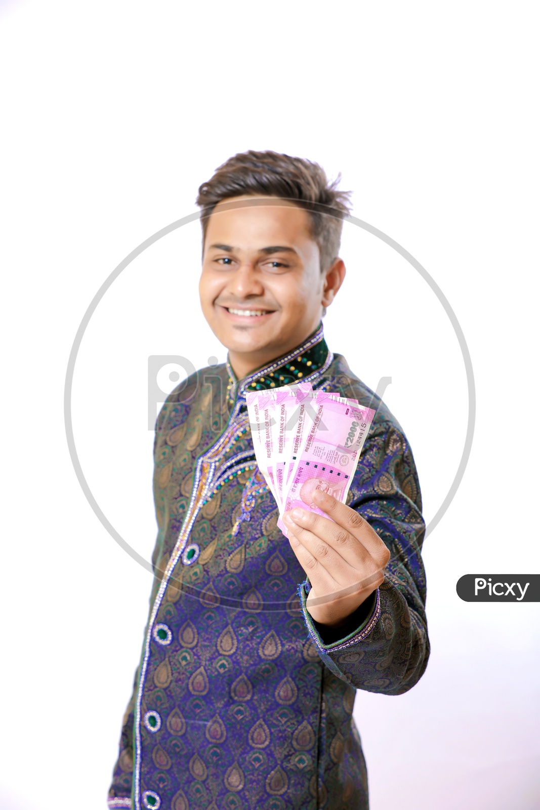 Indian Happy Businessman Holding Money in His Hands On an isolated White background