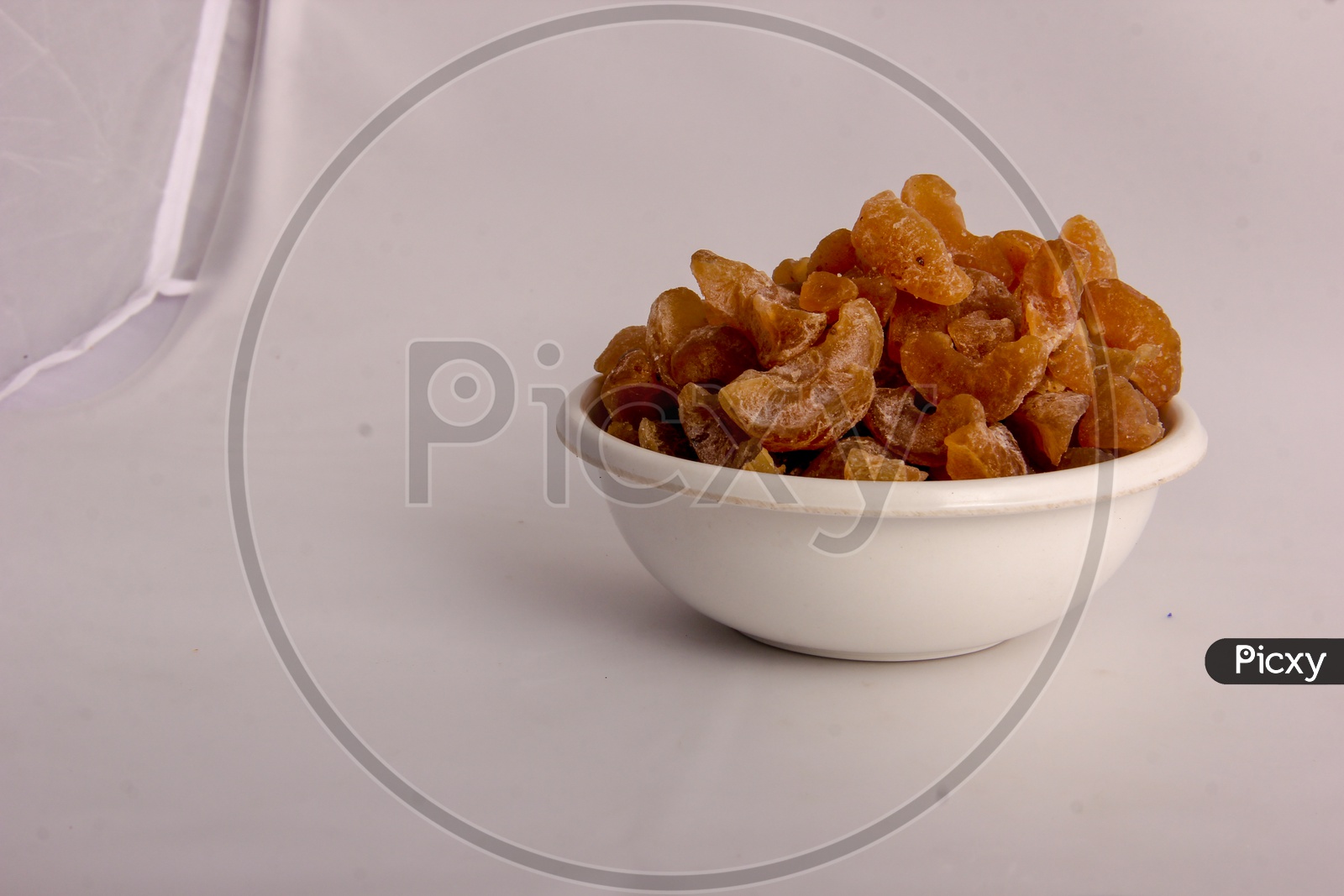 Dry Gooseberry in a Bowl On an Isolated White Background
