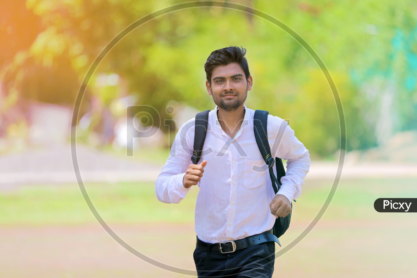 A Young Indian Man wearing  Bag Running and Looking Confident