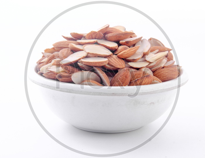 Sliced Almonds in Bowl on a Isolated White Background