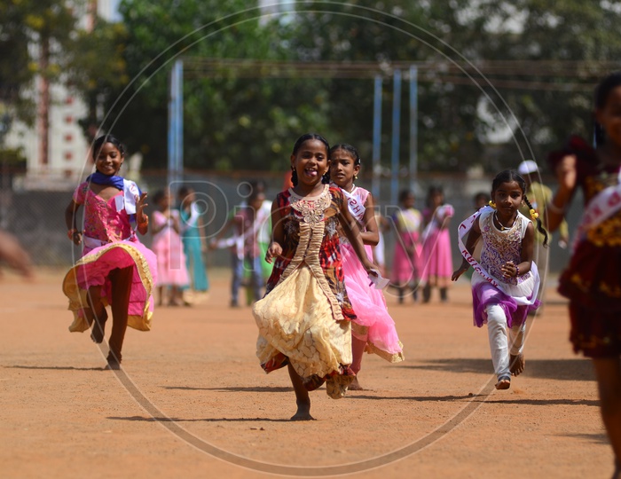 Girls participate in games conducted during National Child Labour Project program