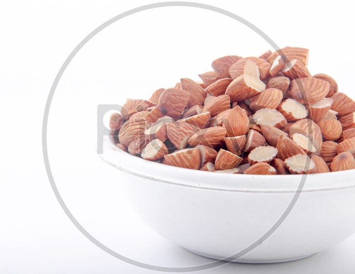 Sliced Almonds in Bowl Isolated in White Background