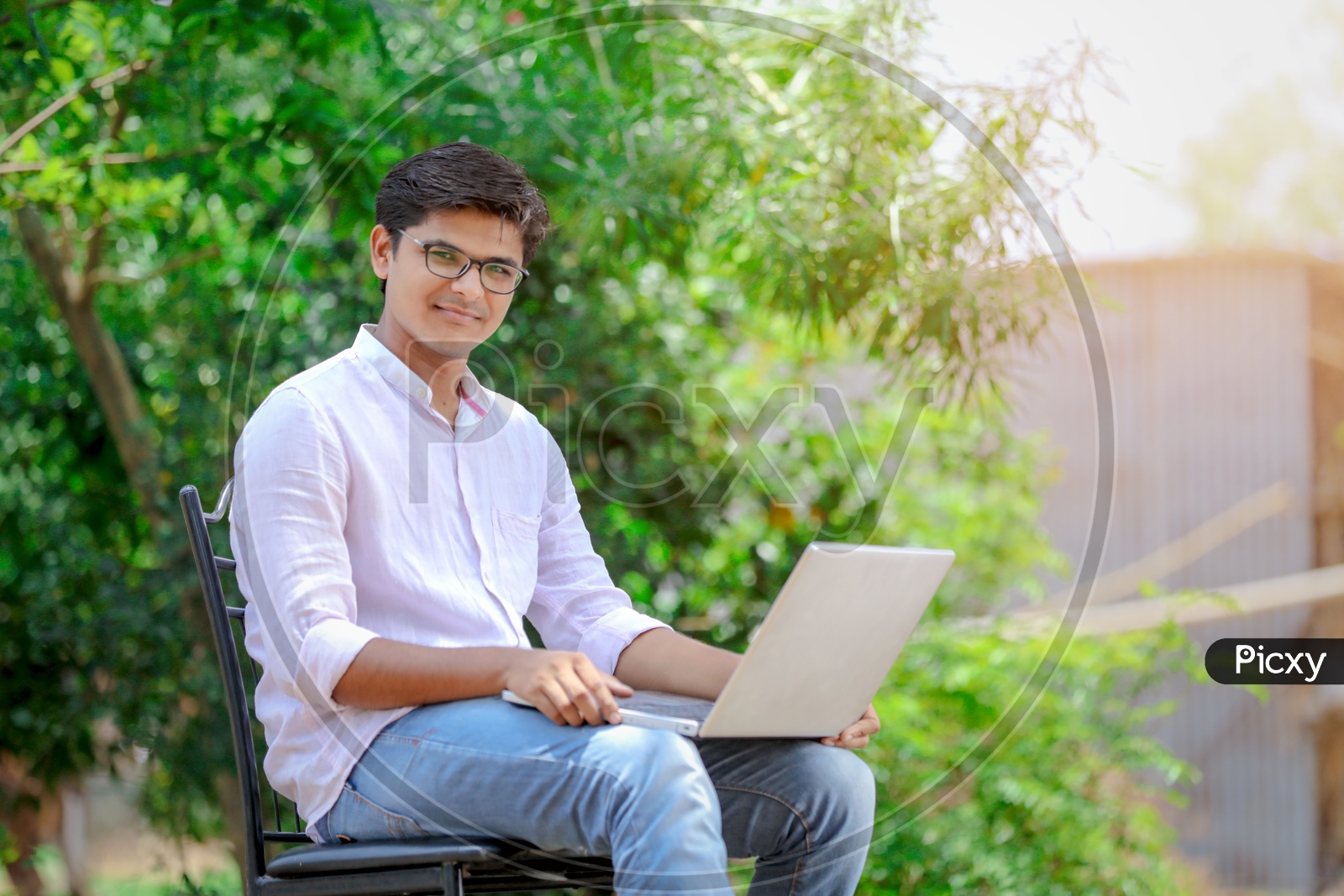 Indian College Student using Laptop