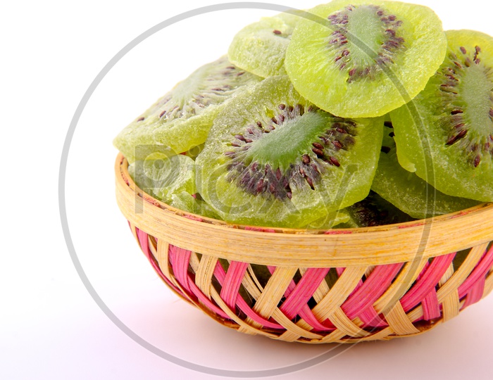 Dry Kiwi Slices in Bowl Isolated in White Background/Dry Fruits