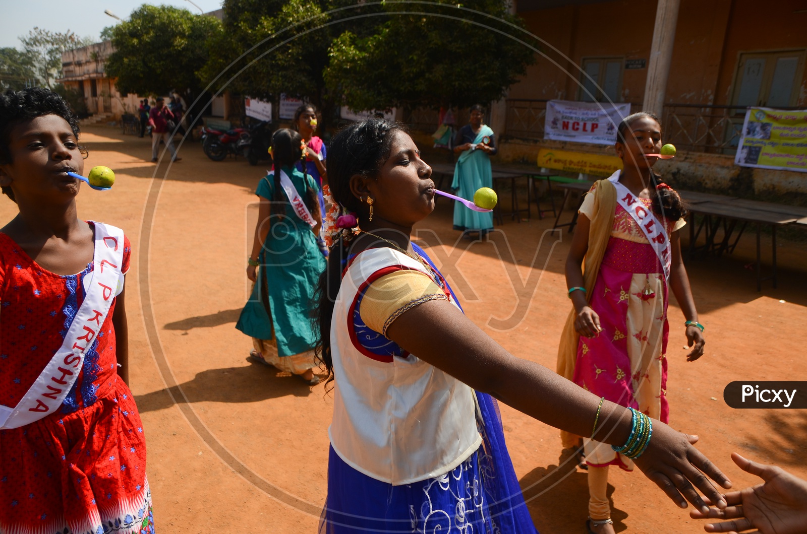 Image of Children participate in games conducted during National Child