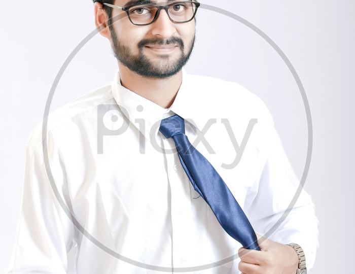 Young handsome man with White background a happy and cool smile on face / Young Man Portrait / Happy Face
