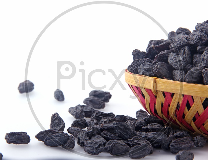 Dried fruit -  Kiss miss in a bowl  on white background
