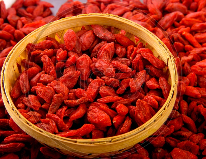 Red Raisins Bowl in White Background