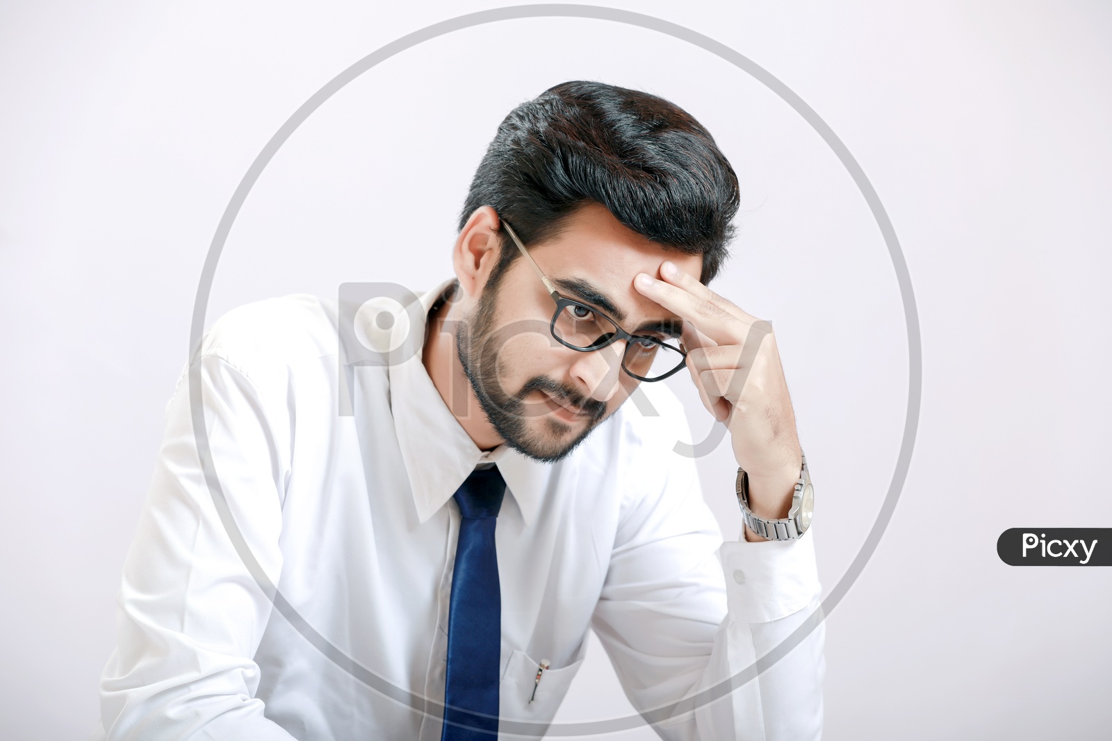 Indian Businessman on Spectacles Thinking