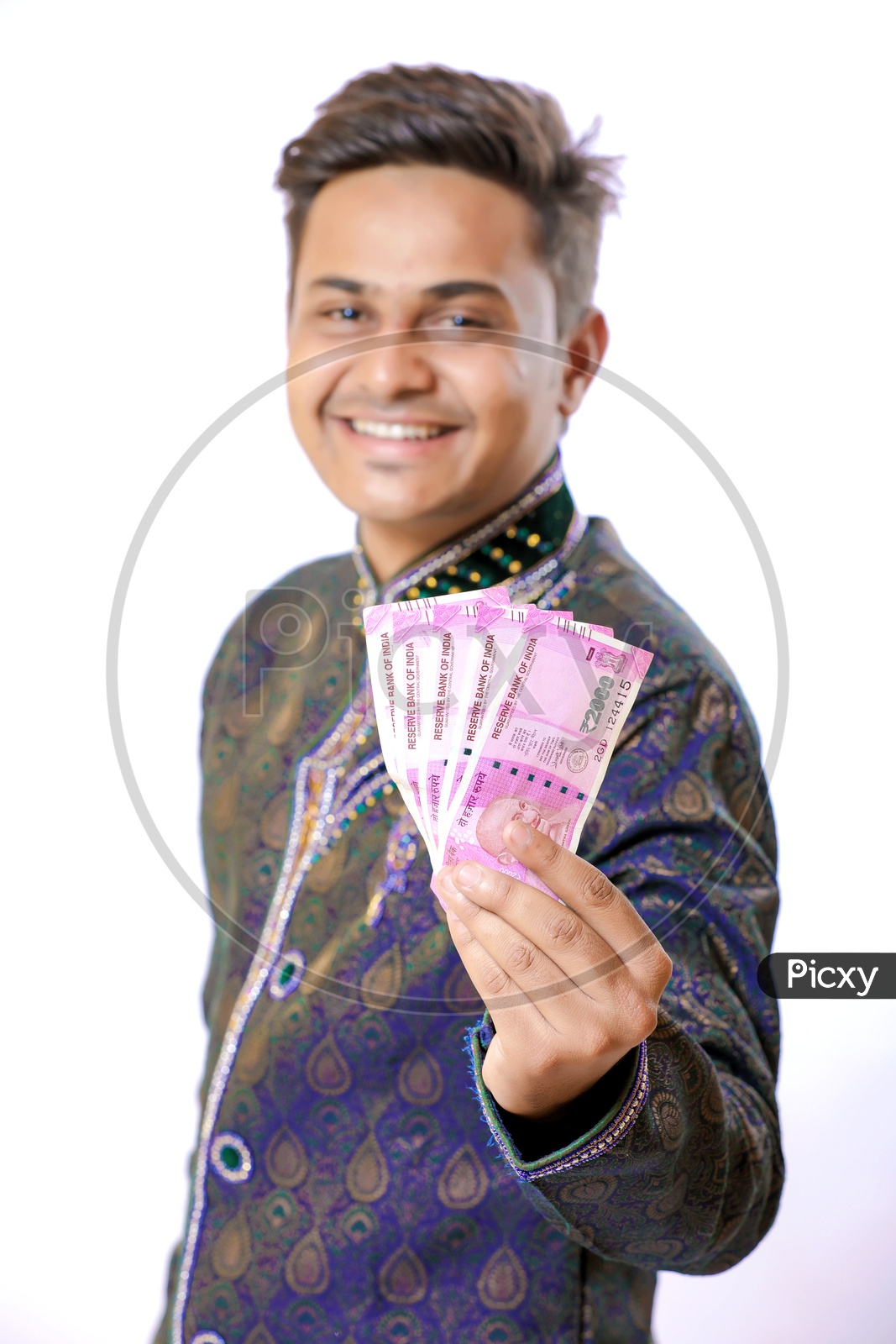 Indian Happy Businessman Holding Money in His Hands On an isolated White background