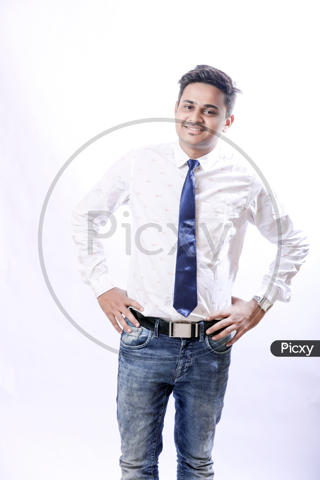 Portrait Of A Confident Youngman in Formalwear  With Expression and looking to Camera With White  Background