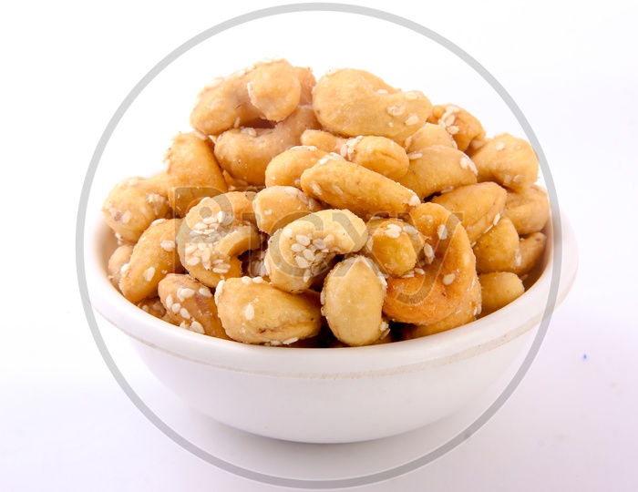 Sugar Sesame Cashew  in Bowl Isolated in White Background