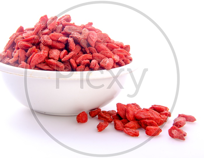 Red Raisins Bowl in White Background