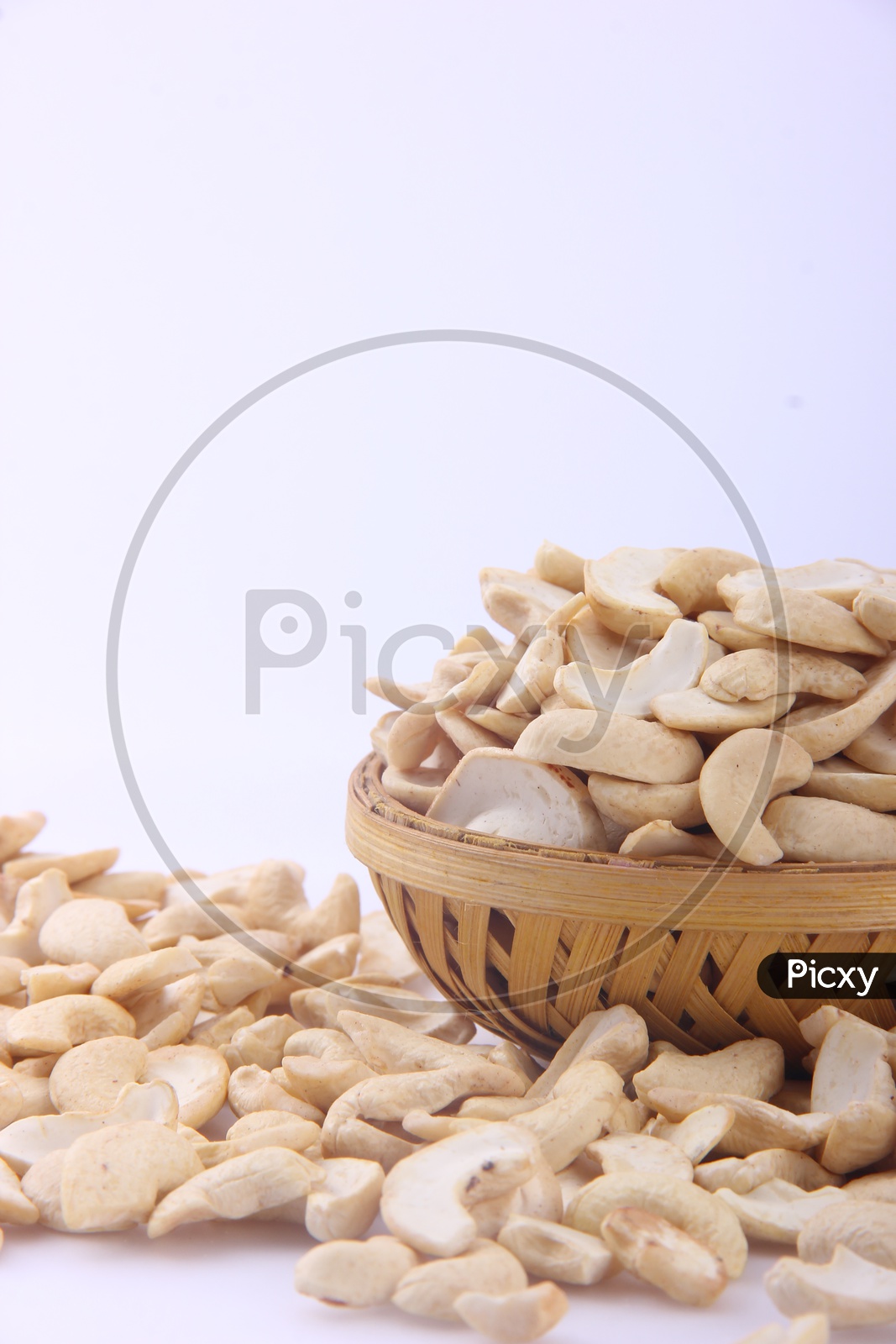 Bowl of Cashews / Cashews  in a Bowl isolated on a White Background