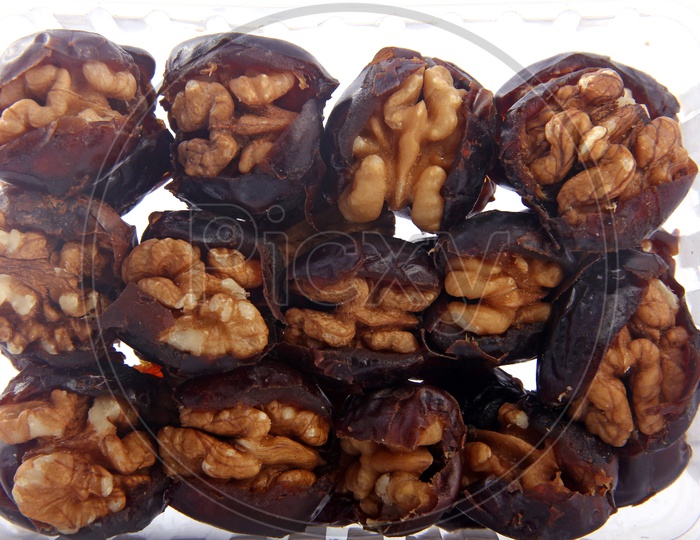 Walnut-Stuffed Dates Situated Arbitrarily
