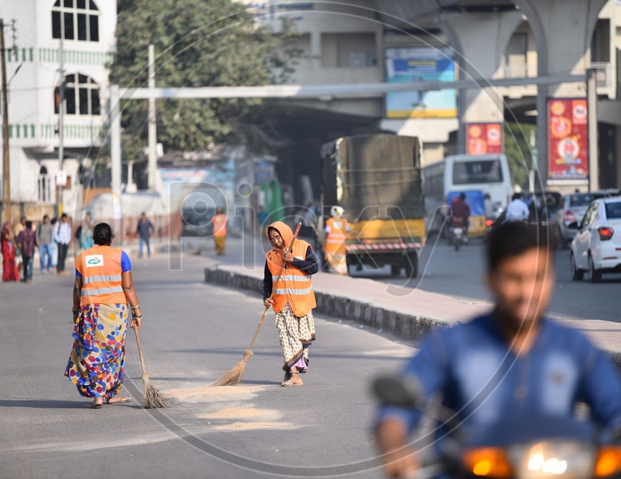 Image of GHMC Workers Cleaning RoadVX842940Picxy