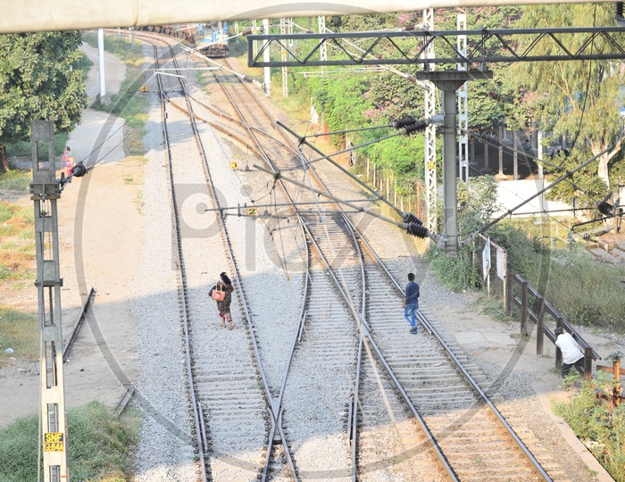 Woman Crossing Railway Track